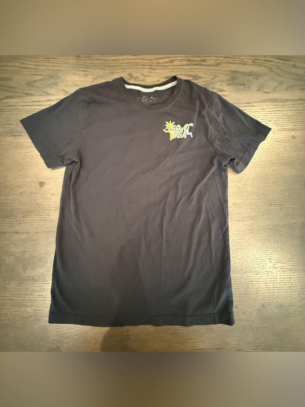 Men's Short-Sleeve Black Tee with Yellow Chest Graphic
